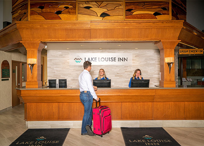 Welcoming front desk staff at check in