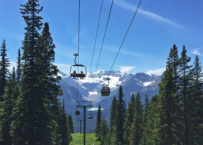 Ride the chair or the gondola up the mountain at Lake Louise Resort in summer