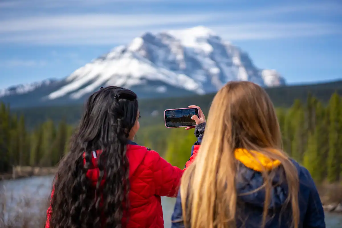 Taking photos on a hike in Lake Louise