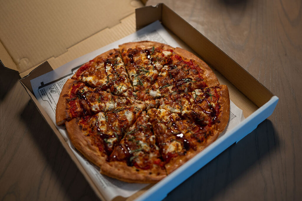 pizza in a box from Timberwolf Pizza & Pasta Cafe