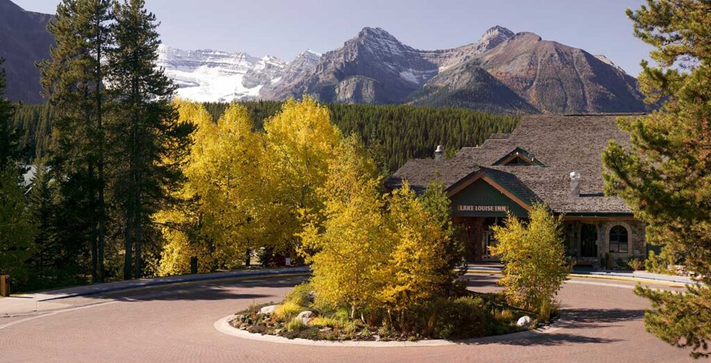 Lake Louise Inn exterior with Fall colours